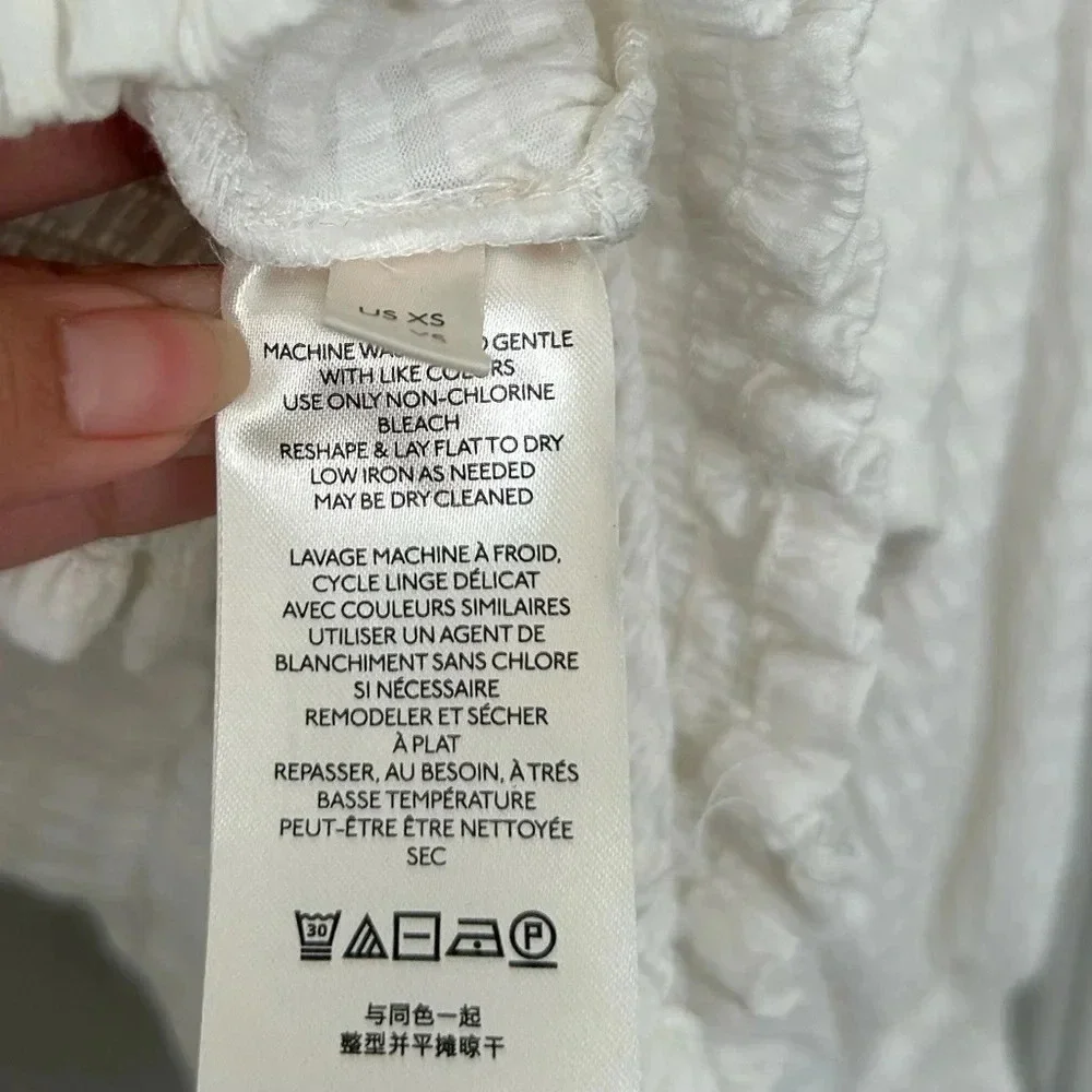 Anthropologie Rebecca smocked top puff sleeves white size small